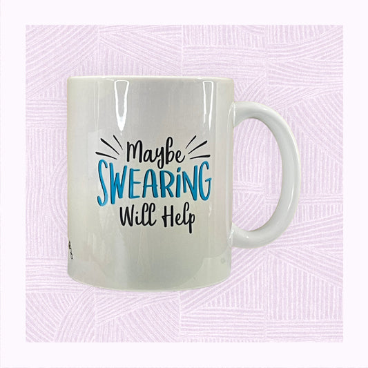 Ceramic mug with a blue pastel background and the phrase ‘Maybe swearing will help’ on it as if exploding off the mug.