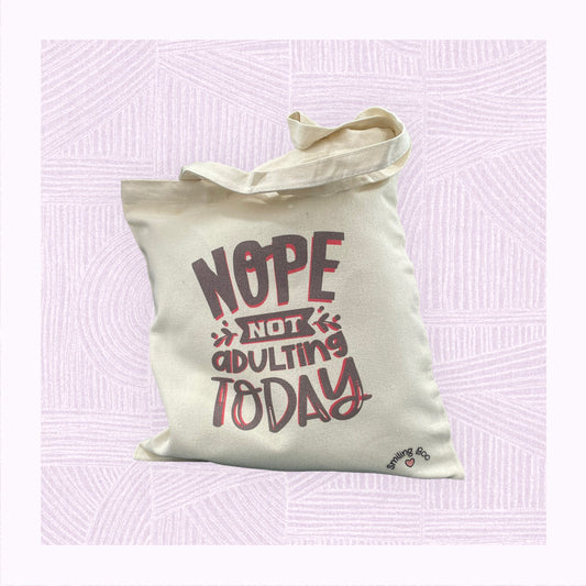 Canvas tote bag with the phrase ‘Nope! Not Adulting Today’.