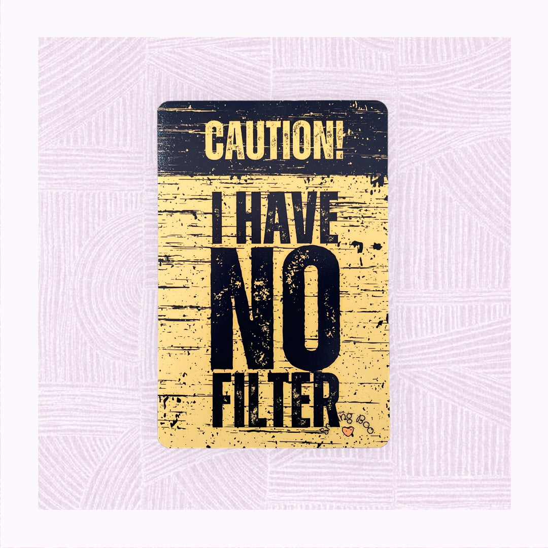 Postcard art print with a yellow and black distressed background, with the phrase ‘Caution! I Have No Filter’.