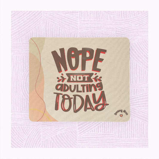 Rectangle mouse mat with a pastel background and the phrase ‘Nope! Not Adulting Today’.